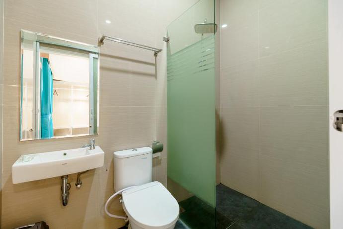 Imagen de la habitación del Hotel Reddoorz Plus @ Point Phila Cihampelas. Foto 12