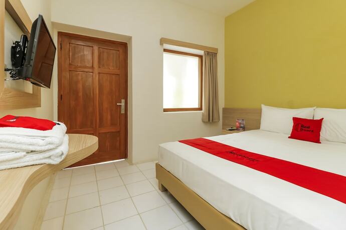 Imagen de la habitación del Hotel Reddoorz Plus @ Slamet Riyadi. Foto 20