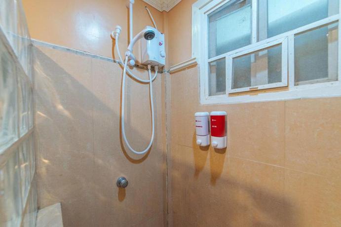 Imagen de la habitación del Hotel Reddoorz Plus @ Starhomes Olivianville. Foto 8