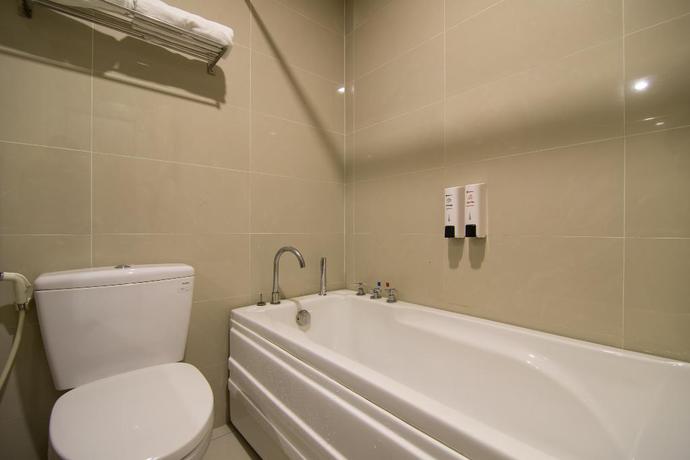 Imagen de la habitación del Hotel Reddoorz Plus @ Trung Son Residence. Foto 11