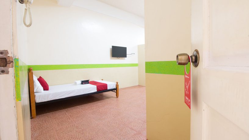 Imagen de la habitación del Hotel Reddoorz @ Praferosa Resort Calamba. Foto 7
