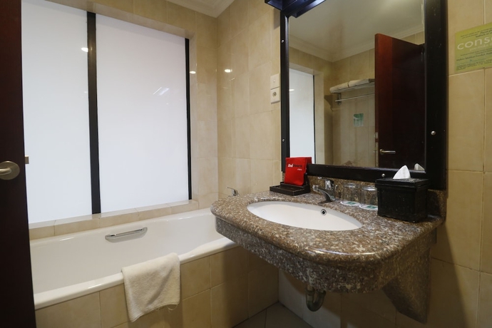 Imagen de la habitación del Hotel Reddoorz Premium @ Bukit Damai Indah. Foto 16