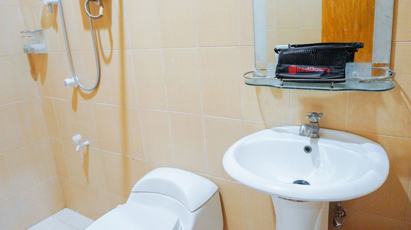 Imagen de la habitación del Hotel Reddoorz Premium @ Gabinete Road Palawan. Foto 10