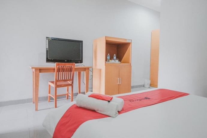 Imagen de la habitación del Hotel Reddoorz Premium @ Jalan Pal 10 Jambi. Foto 9