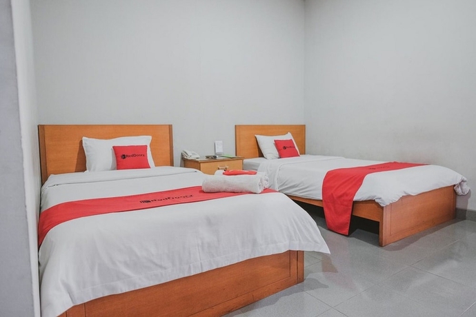 Imagen de la habitación del Hotel Reddoorz Premium @ Jalan Pal 10 Jambi. Foto 10