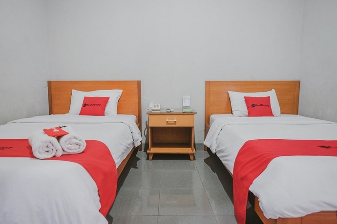 Imagen de la habitación del Hotel Reddoorz Premium @ Jalan Pal 10 Jambi. Foto 11