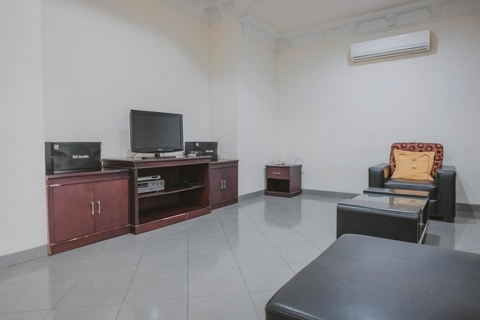 Imagen de la habitación del Hotel Reddoorz Premium @ Jalan Pal 10 Jambi. Foto 12