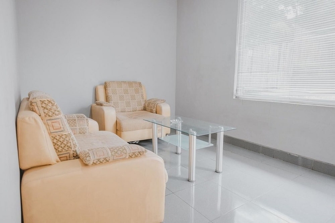 Imagen de la habitación del Hotel Reddoorz Premium @ Jalan Pal 10 Jambi. Foto 13