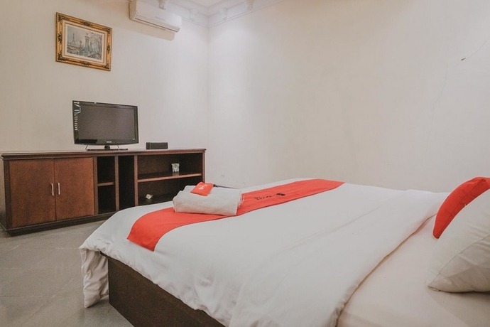 Imagen de la habitación del Hotel Reddoorz Premium @ Jalan Pal 10 Jambi. Foto 15