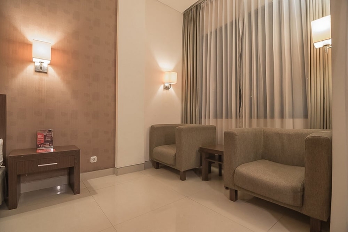 Imagen de la habitación del Hotel Reddoorz Premium Near Paris Van Java Mall. Foto 9