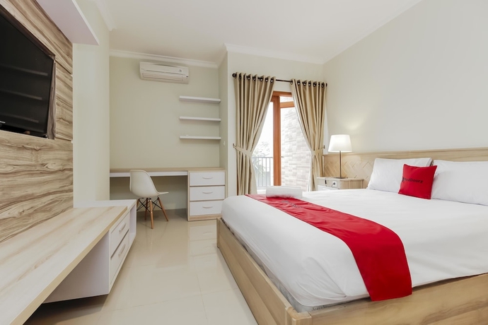 Imagen de la habitación del Hotel Reddoorz Premium Near Ragunan Zoo 2. Foto 4
