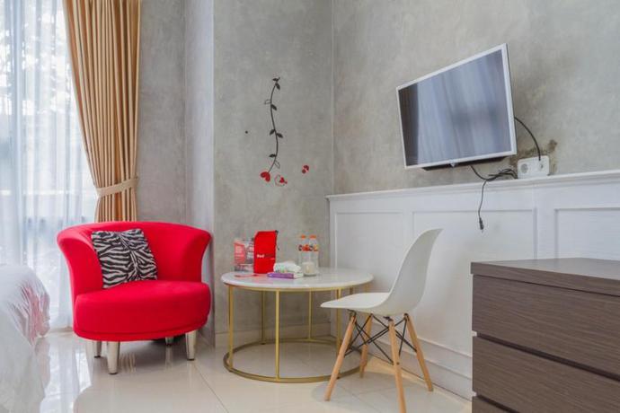 Imagen de la habitación del Hotel Reddoorz Premium @ The Batik Moh. Toha. Foto 11