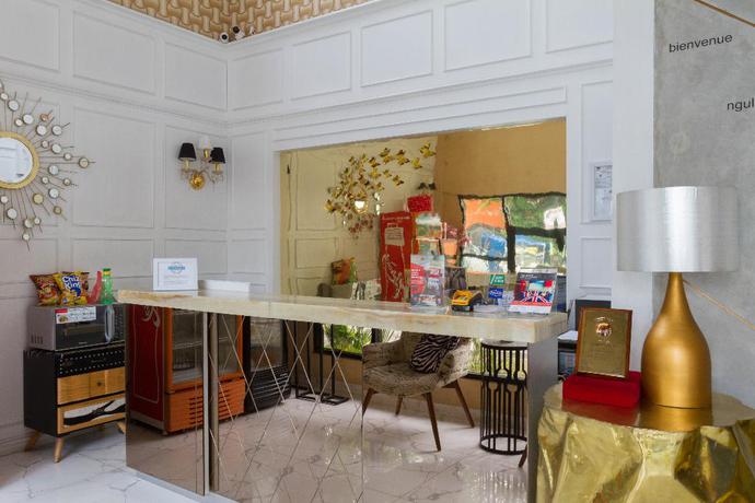 Imagen de los interiores del Hotel Reddoorz Premium @ The Batik Moh. Toha. Foto 18