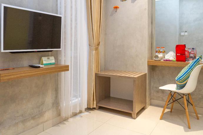 Imagen de la habitación del Hotel Reddoorz Premium @ The Batik Moh. Toha. Foto 15