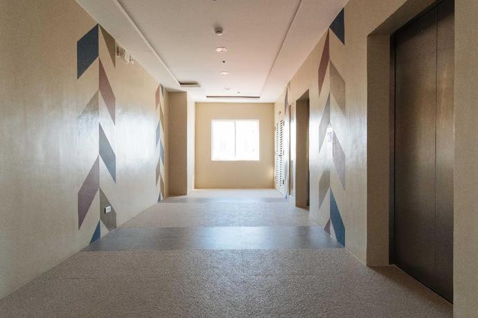 Imagen de los interiores del Hotel Reddoorz Premium @ Vista Heights Legarda. Foto 16