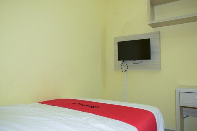 Imagen de la habitación del Hotel Reddoorz Syariah Near Jogja City Mall 2. Foto 16