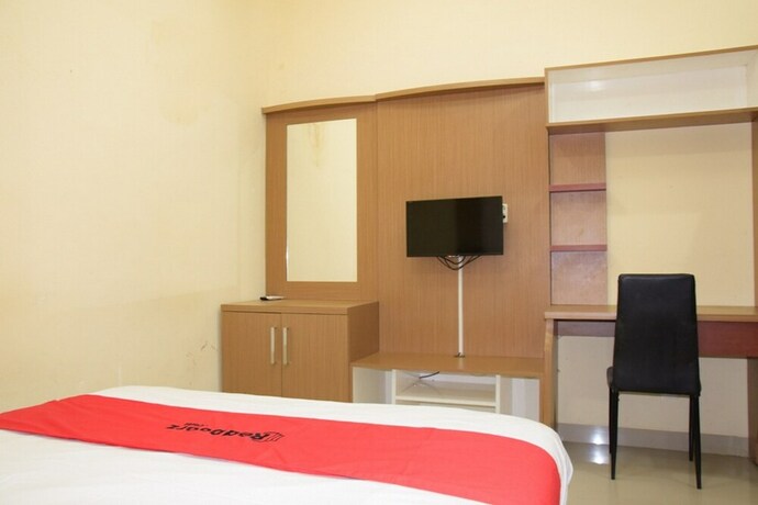 Imagen de la habitación del Hotel Reddoorz Syariah Near Jogja City Mall 2. Foto 19