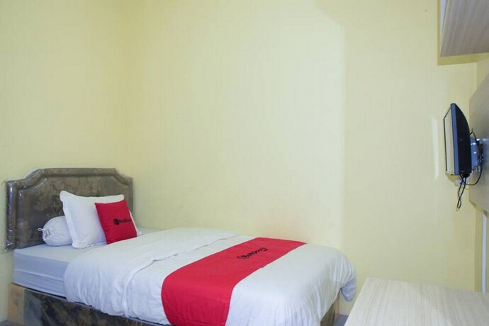 Imagen de la habitación del Hotel Reddoorz Syariah Near Jogja City Mall 2. Foto 20
