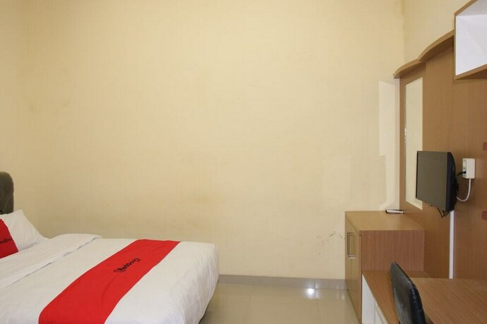 Imagen de la habitación del Hotel Reddoorz Syariah Near Jogja City Mall 2. Foto 22
