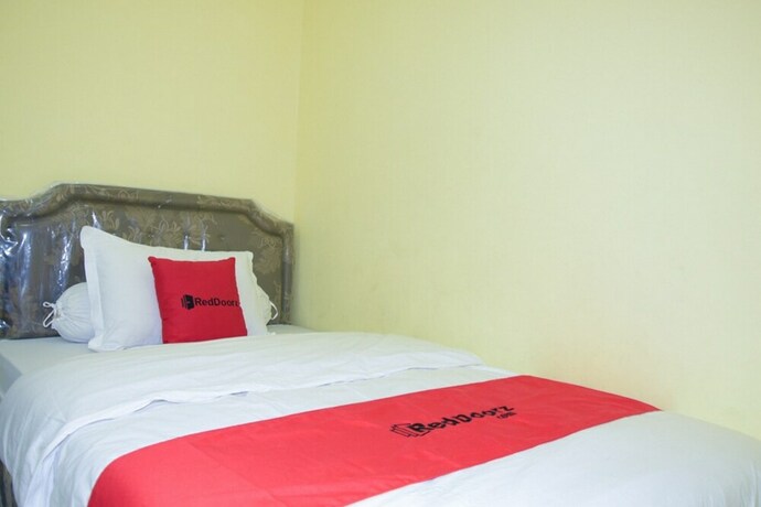Imagen de la habitación del Hotel Reddoorz Syariah Near Jogja City Mall 2. Foto 25