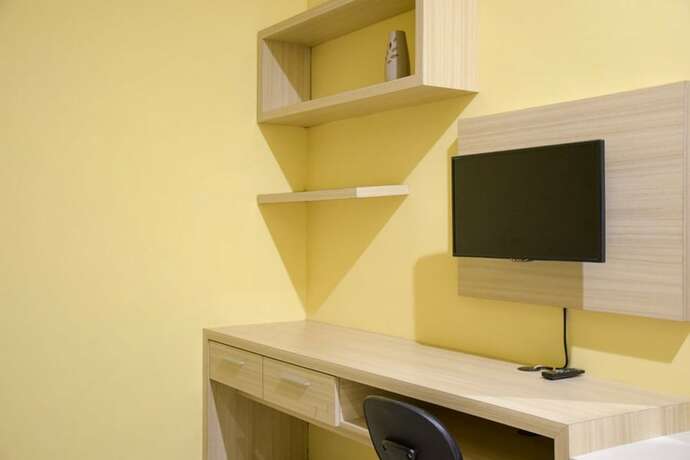 Imagen de la habitación del Hotel Reddoorz Syariah Near Jogja City Mall 2. Foto 26