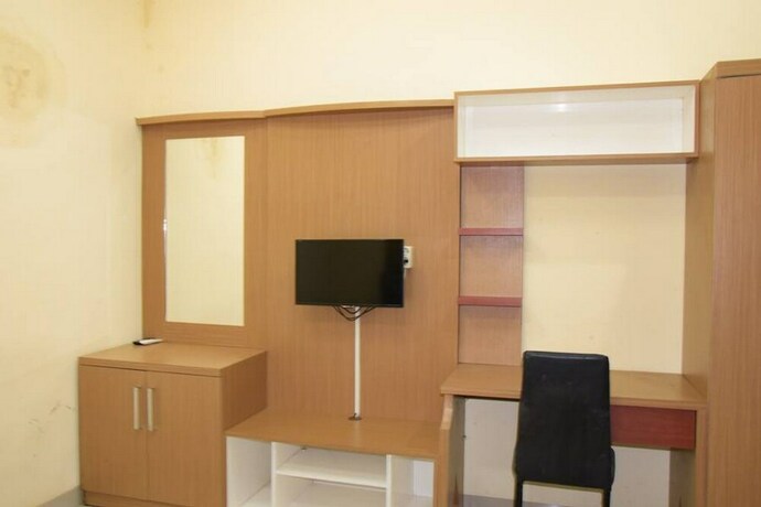 Imagen de la habitación del Hotel Reddoorz Syariah Near Jogja City Mall 2. Foto 27