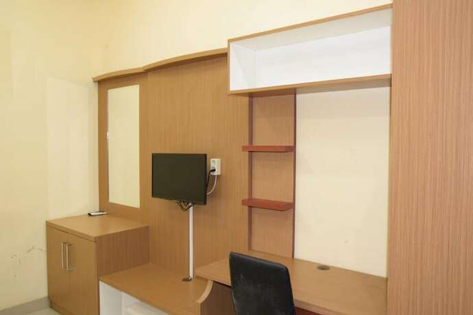 Imagen de la habitación del Hotel Reddoorz Syariah Near Jogja City Mall 2. Foto 31