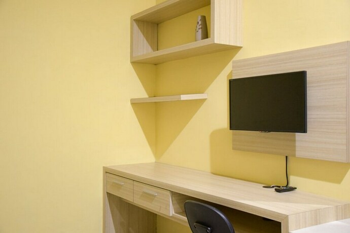 Imagen de la habitación del Hotel Reddoorz Syariah Near Jogja City Mall 2. Foto 33