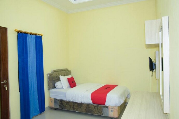 Imagen de la habitación del Hotel Reddoorz Syariah Near Jogja City Mall 2. Foto 34