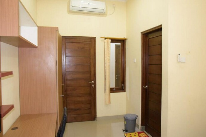 Imagen de la habitación del Hotel Reddoorz Syariah Near Jogja City Mall 2. Foto 37