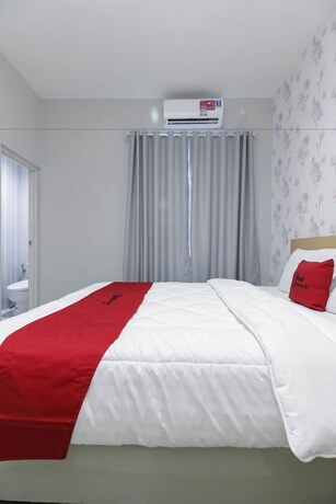 Imagen de la habitación del Hotel Reddoorz Syariah Near Metropolitan Mall Bekasi. Foto 21