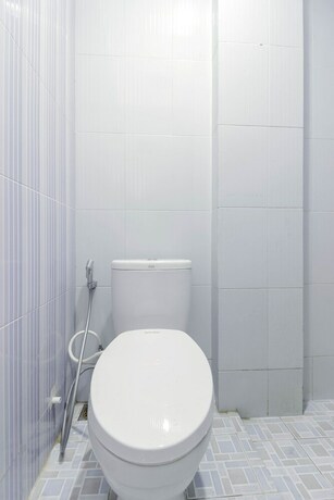 Imagen de la habitación del Hotel Reddoorz Syariah Near Metropolitan Mall Bekasi. Foto 24