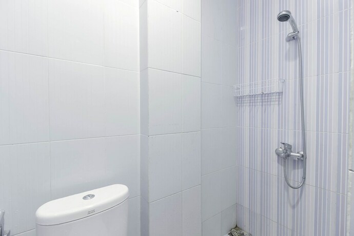 Imagen de la habitación del Hotel Reddoorz Syariah Near Metropolitan Mall Bekasi. Foto 28