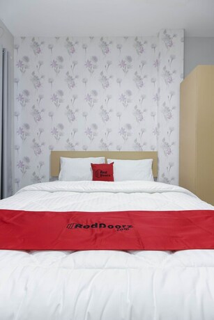 Imagen de la habitación del Hotel Reddoorz Syariah Near Metropolitan Mall Bekasi. Foto 29