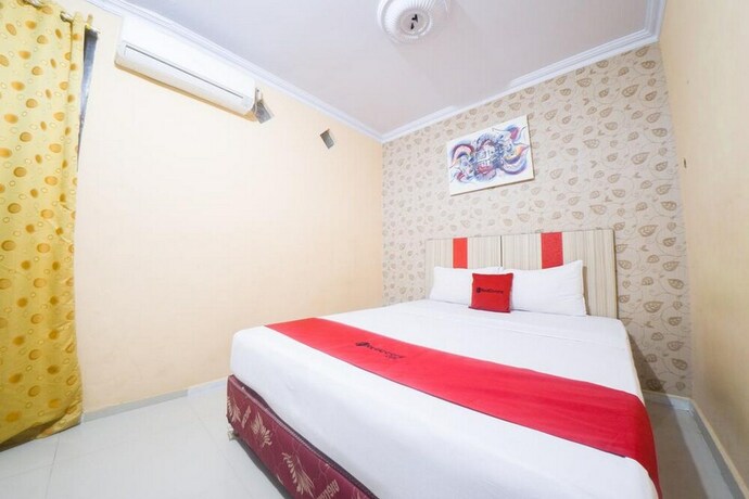 Imagen de la habitación del Hotel Reddoorz Syariah Near Rsud Ainun Habibie Gorontalo. Foto 16