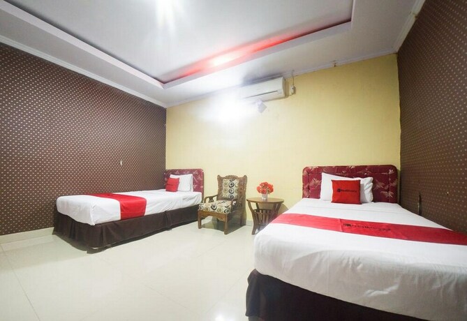 Imagen de la habitación del Hotel Reddoorz Syariah Near Rsud Ainun Habibie Gorontalo. Foto 19