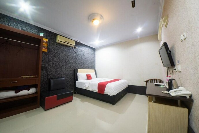 Imagen de la habitación del Hotel Reddoorz Syariah Near Rsud Ainun Habibie Gorontalo. Foto 20