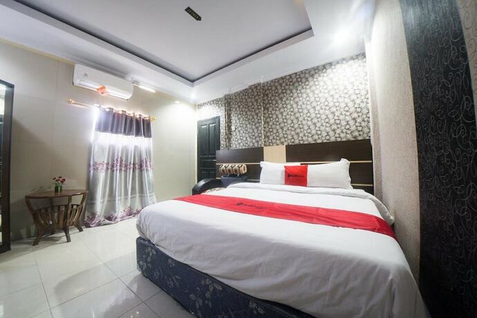 Imagen de la habitación del Hotel Reddoorz Syariah Near Rsud Ainun Habibie Gorontalo. Foto 21