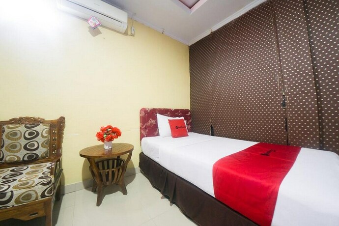 Imagen de la habitación del Hotel Reddoorz Syariah Near Rsud Ainun Habibie Gorontalo. Foto 26