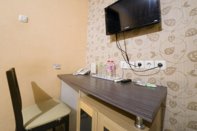 Imagen de la habitación del Hotel Reddoorz Syariah Near Rsud Ainun Habibie Gorontalo. Foto 29