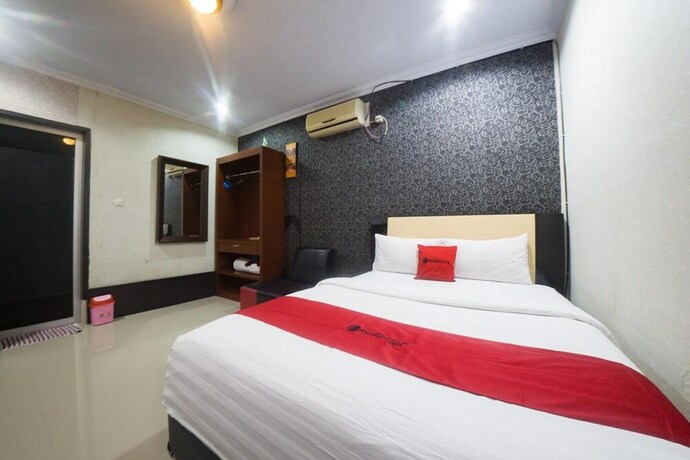 Imagen de la habitación del Hotel Reddoorz Syariah Near Rsud Ainun Habibie Gorontalo. Foto 32