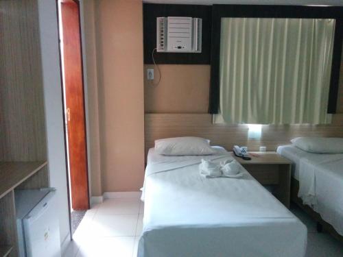 Imagen de la habitación del Hotel Rede Andrade Hangar. Foto 10