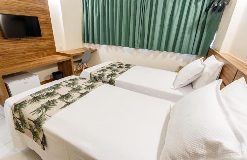 Imagen de la habitación del Hotel Rede Andrade Riviera Premium. Foto 9