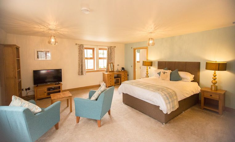 Imagen de la habitación del Hotel Redwood House Hotel. Foto 4