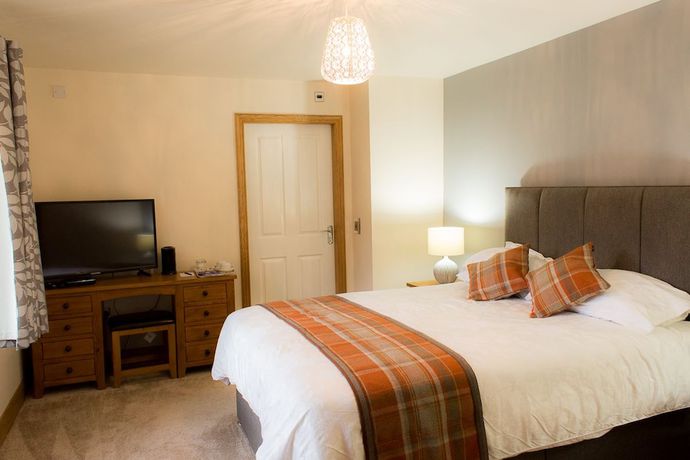 Imagen de la habitación del Hotel Redwood House Hotel. Foto 6