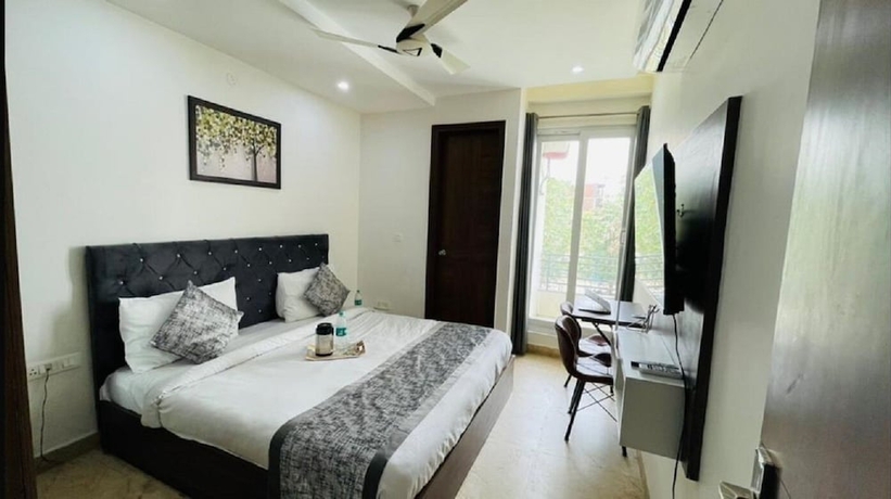 Imagen de la habitación del Hotel Reebah Inn and Suites, Gurugram. Foto 4