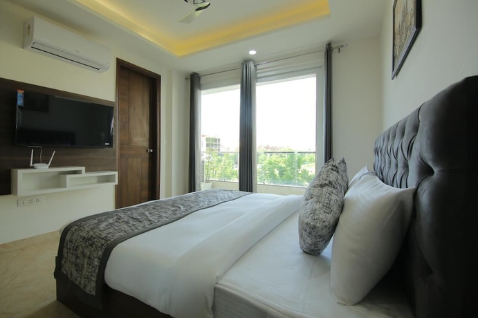Imagen de la habitación del Hotel Reebah Inn and Suites, Gurugram. Foto 5