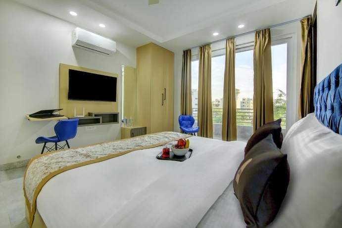 Imagen de la habitación del Hotel Reebah Inn and Suites, Gurugram. Foto 6