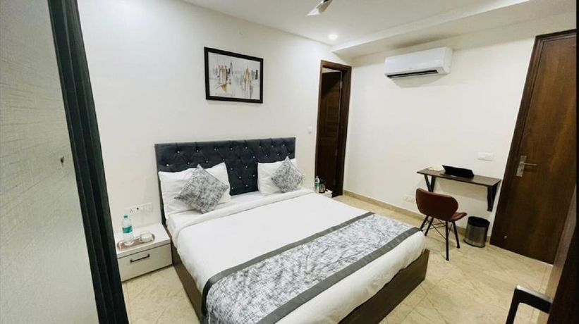 Imagen de la habitación del Hotel Reebah Inn and Suites, Gurugram. Foto 9