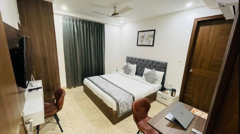 Imagen de la habitación del Hotel Reebah Inn and Suites, Gurugram. Foto 10